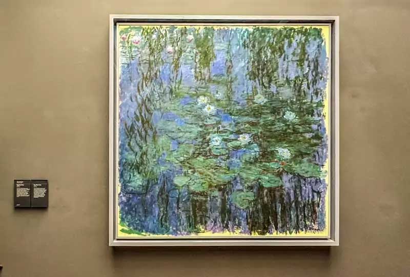 Claude Monet’s “Blue Water Lilies” painting exhibited at the Musée d’Orsay in Paris.