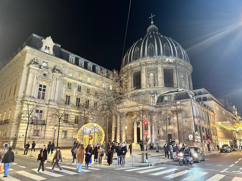 Christmas decorations and elegant holiday lights at Place Maurice Barrès in Paris