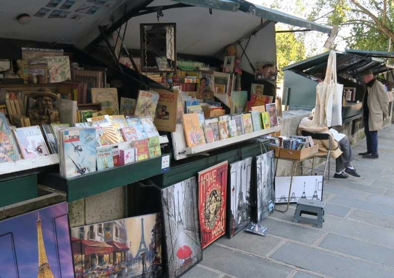 Bouquinistes selling books along the Seine in Paris
