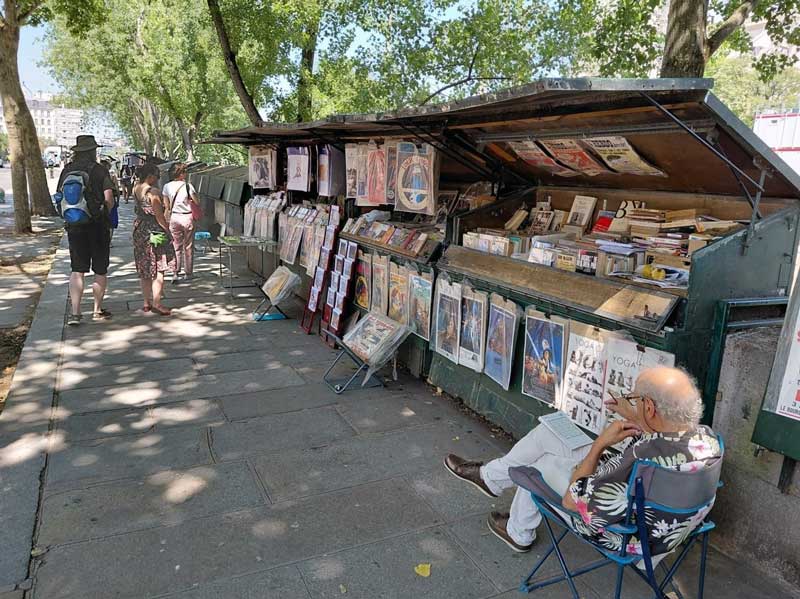 Green bookstalls of the Paris bouquinistes along the Seine