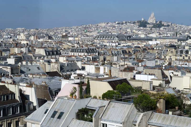 Historical view of zinc rooftops in Paris and their architectural development