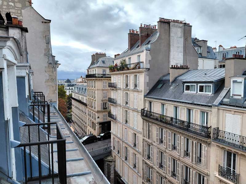 Zinc rooftops in Paris illustrating why zinc became the city’s standard roofing material