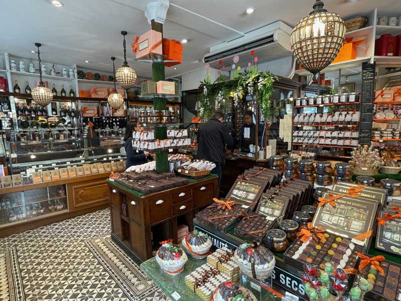 Interior of La Mère de Famille chocolate store in Paris with traditional sweets and gifts