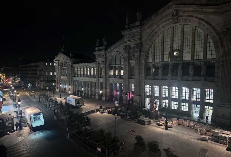 Well-lit area outside Gare du Nord and 25hours Hotel Terminus Nord