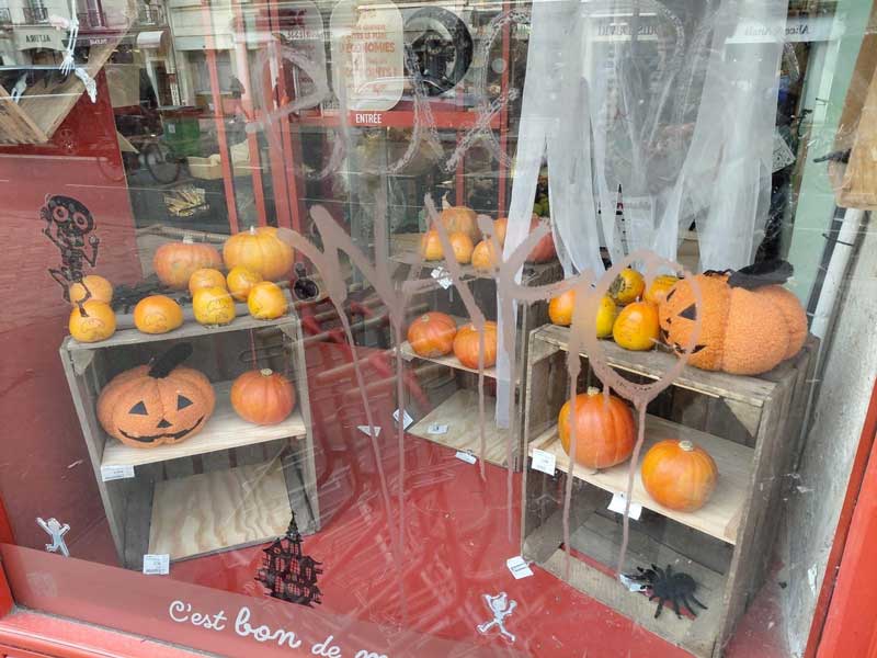 Halloween-themed store window display in Paris, France